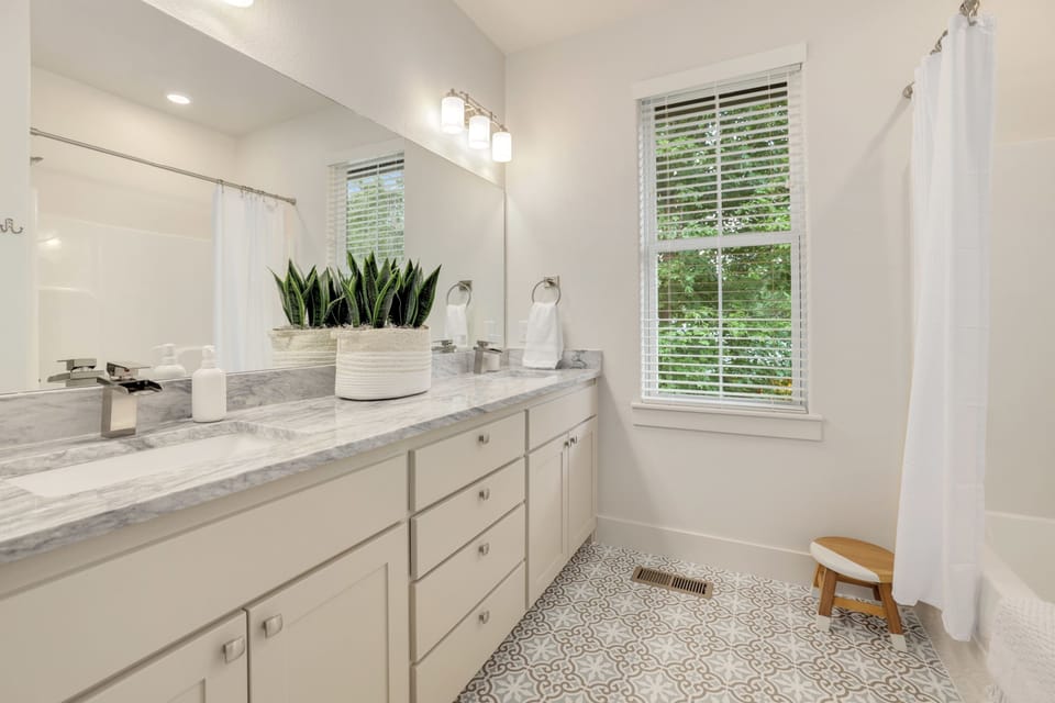 Second floor full bathroom shared between both queen bedrooms