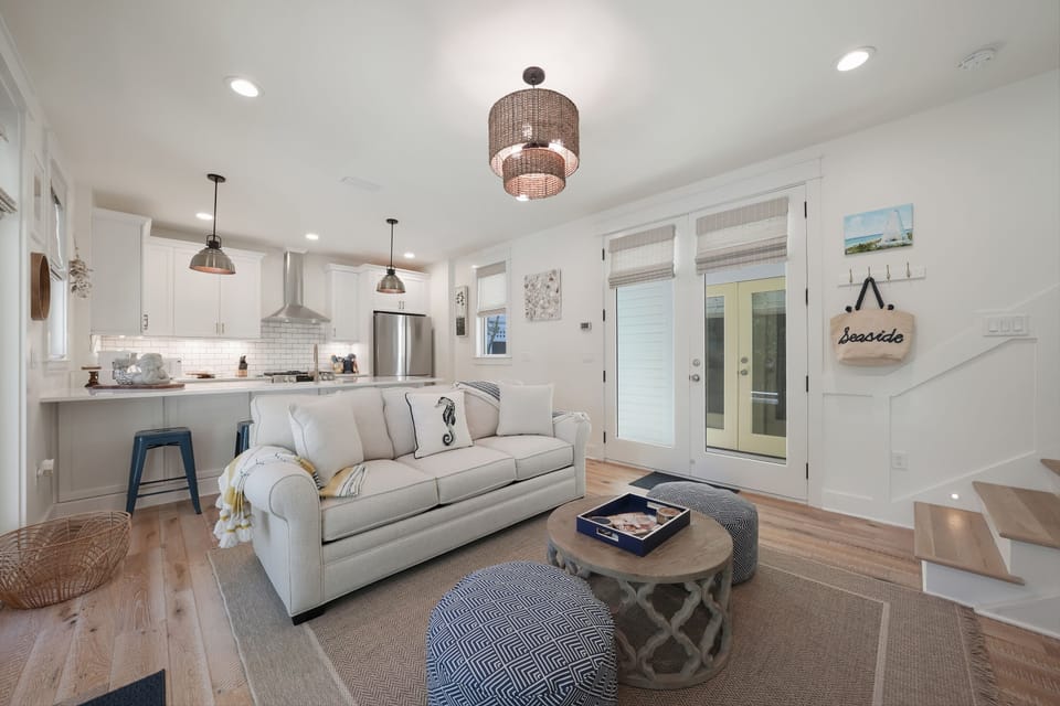 LIVING VIEW TO BREAKFAST BAR AND MODERN KITCHEN
