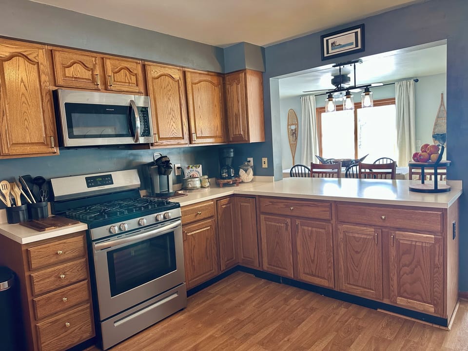 Fully Stocked Kitchen With Keurig and bun coffee maker, soap and dishwasher pods