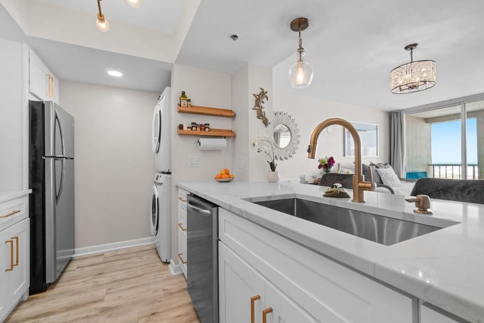 Large Farm Sink, Gorgeous Quarts Counter tops. New appliances. 
