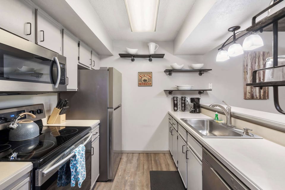 Condo, Multiple Beds, Balcony, Golf View (Golf View Serenity) | Private kitchen | Coffee/tea maker