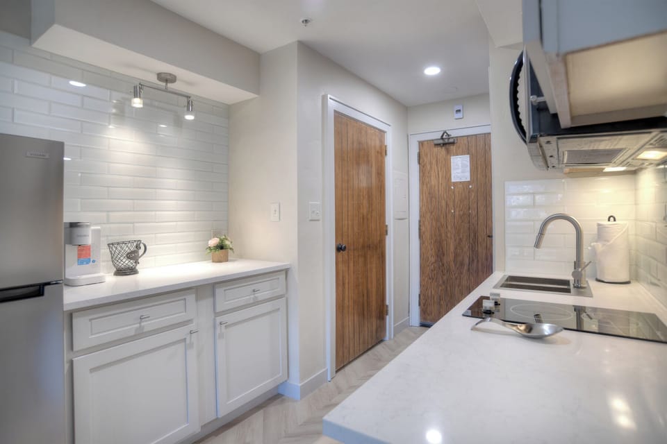 Kitchen with Fridge, Stovetop Burners, Microwave
