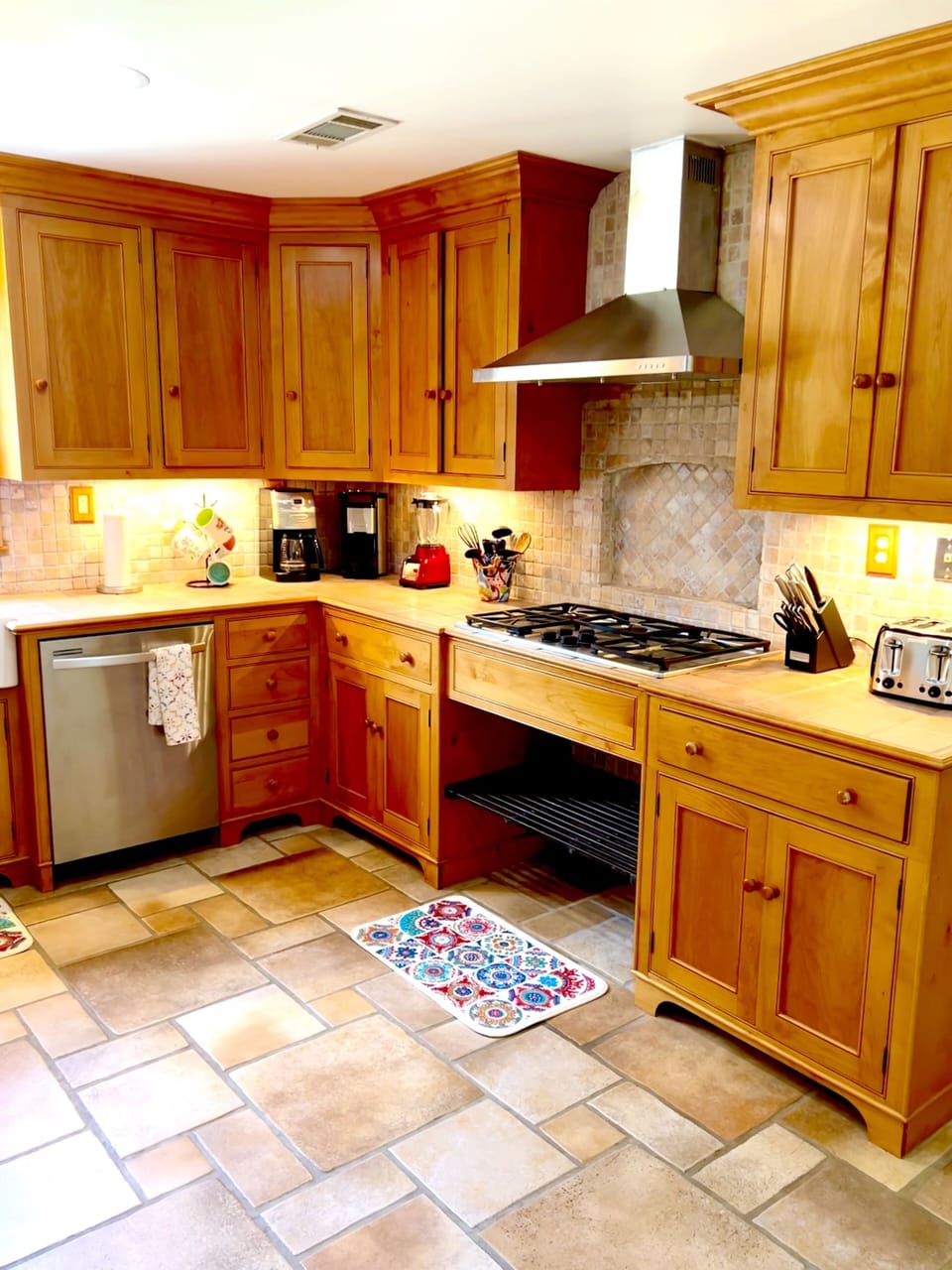The kitchen is spacious and has everything you need to cook a meal at home.