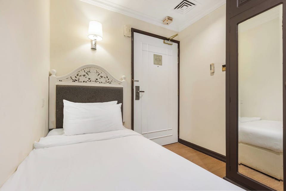 Single Room | In-room safe, blackout drapes, iron/ironing board (on request)