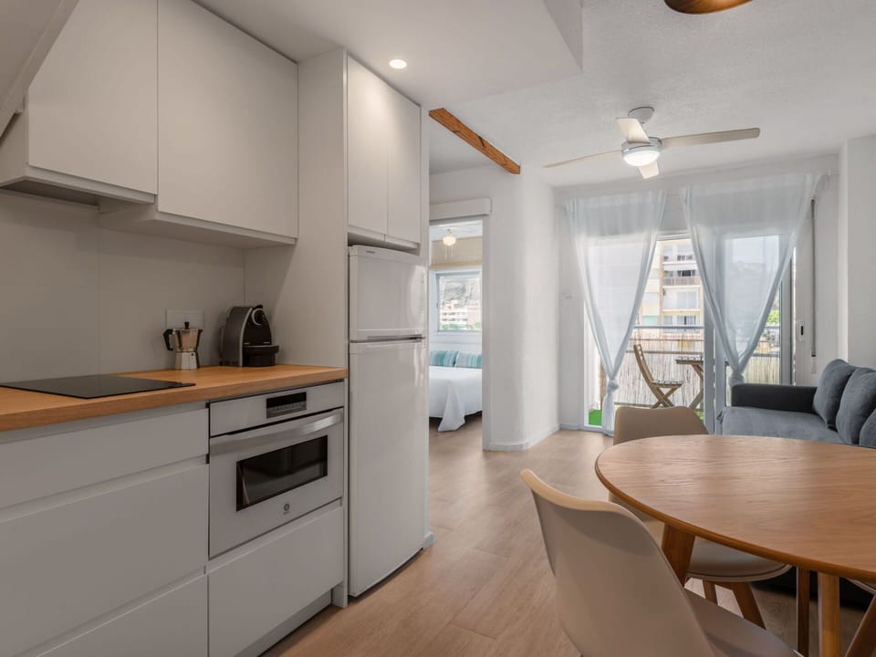 Cabinetry, Furniture, Countertop, Table, Chair, Building, Kitchen Appliance, Kitchen Stove, Wood, Home Appliance