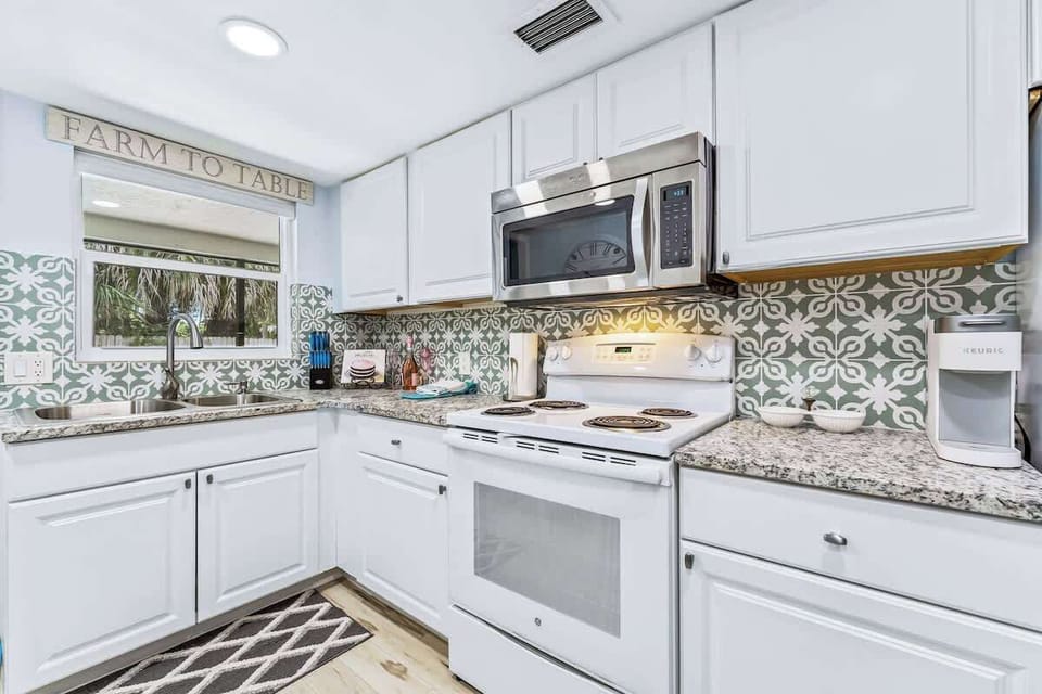 Granite countertop kitchen with everything you need. 