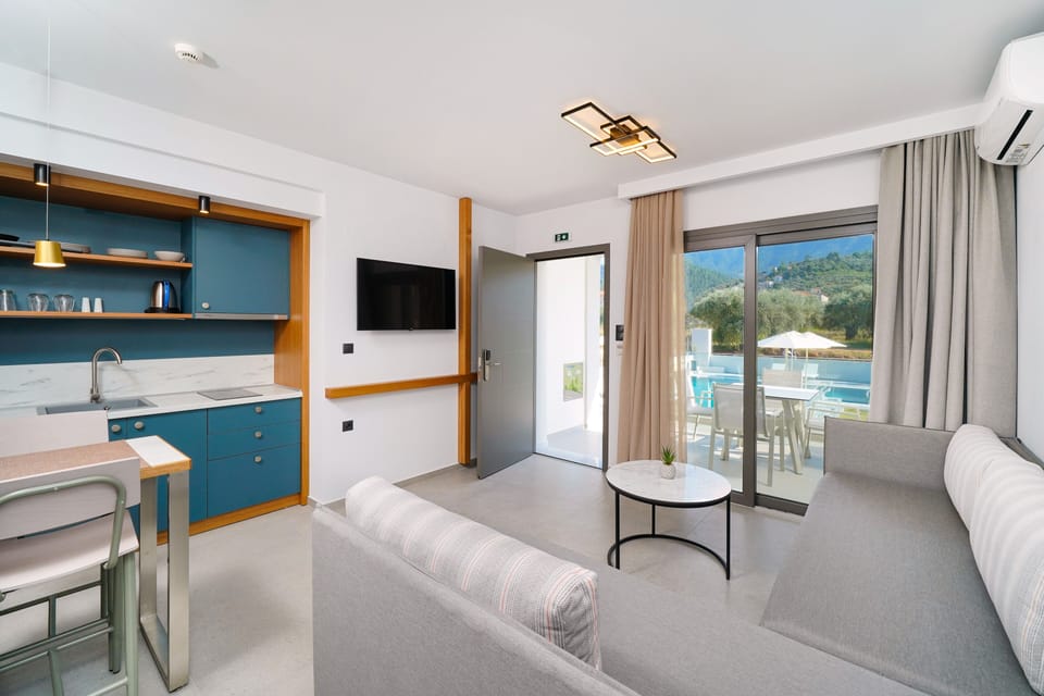 Exclusive Apartment | Living area | 43-inch Smart TV with satellite channels, TV