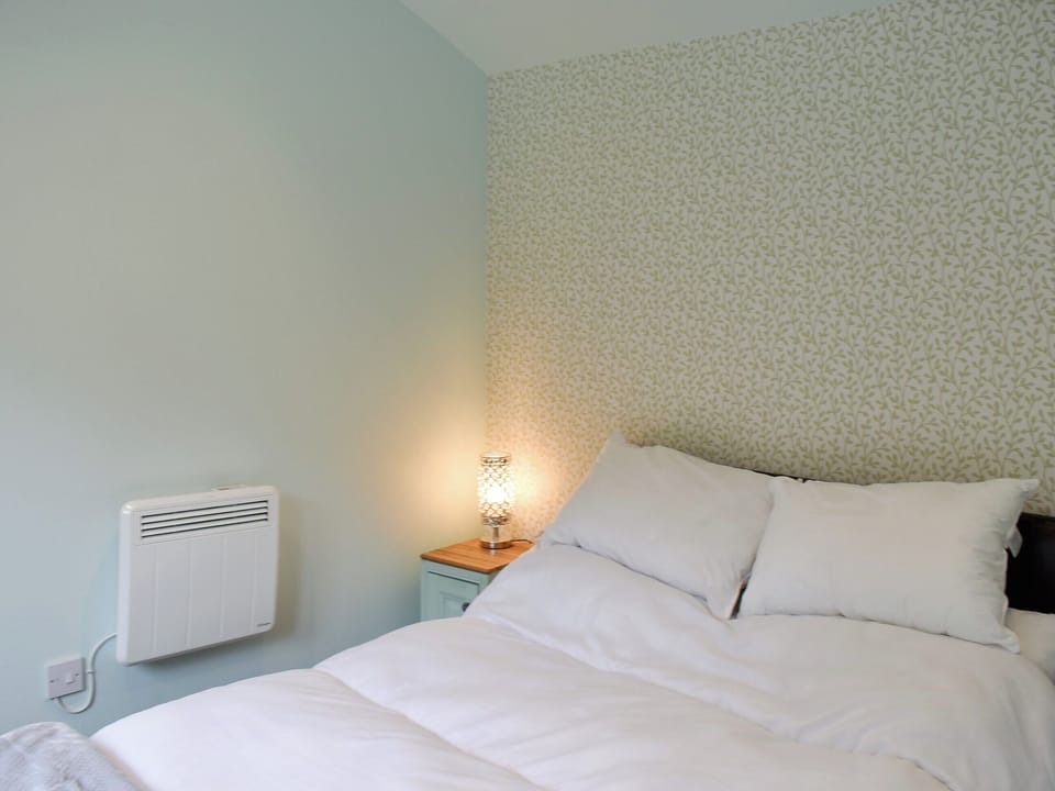 Double bedroom | Shepherds Hut 3 in Kent - The Shepherds Huts at Laddingford, Laddingford, near Maidstone
