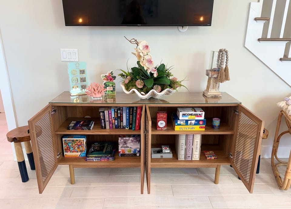 Don't forget to peek in the entertainment center for some of our games, puzzles 