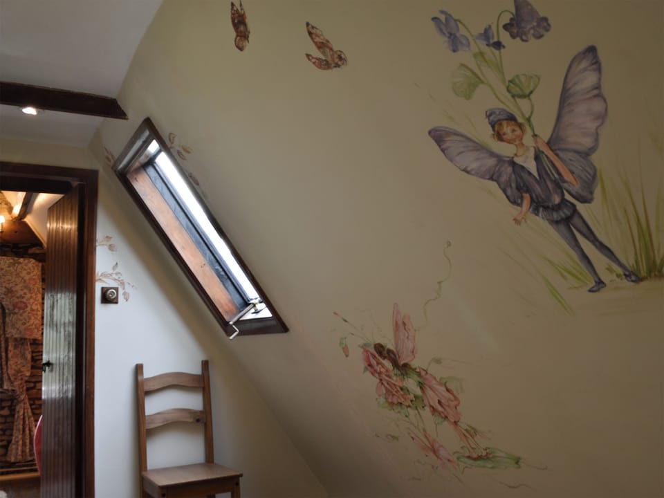 Hallway with hand-painted murals | Baker&rsquo;s Cottage, Hotham, near Beverley
