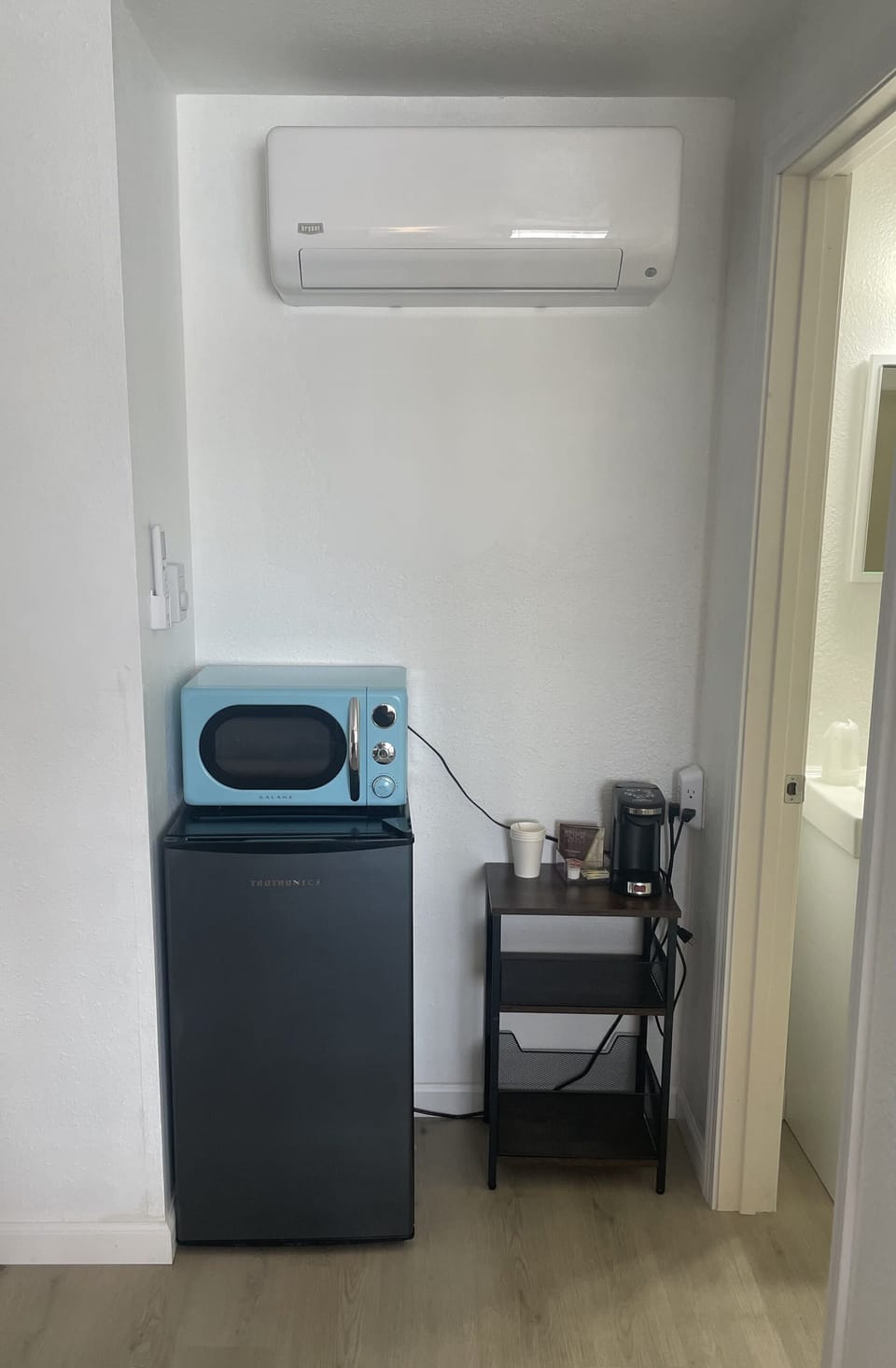 Microwave, fridge and coffee