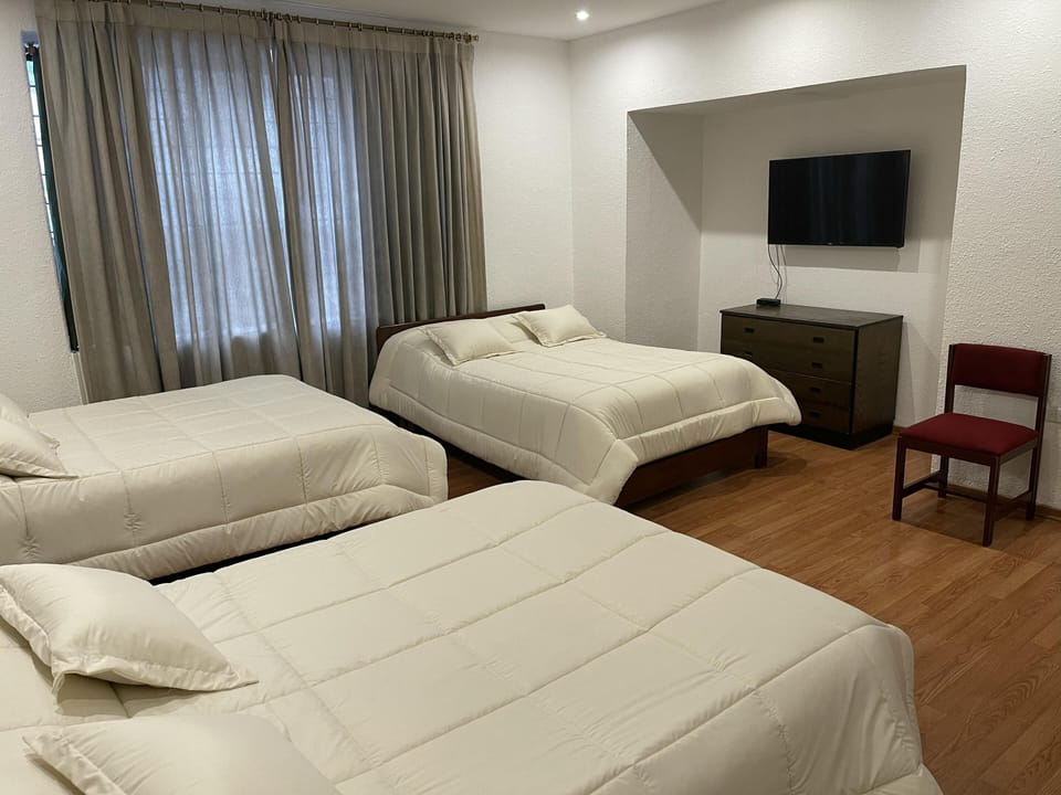 Traditional Triple Room | Blackout drapes, WiFi (free), bed sheets