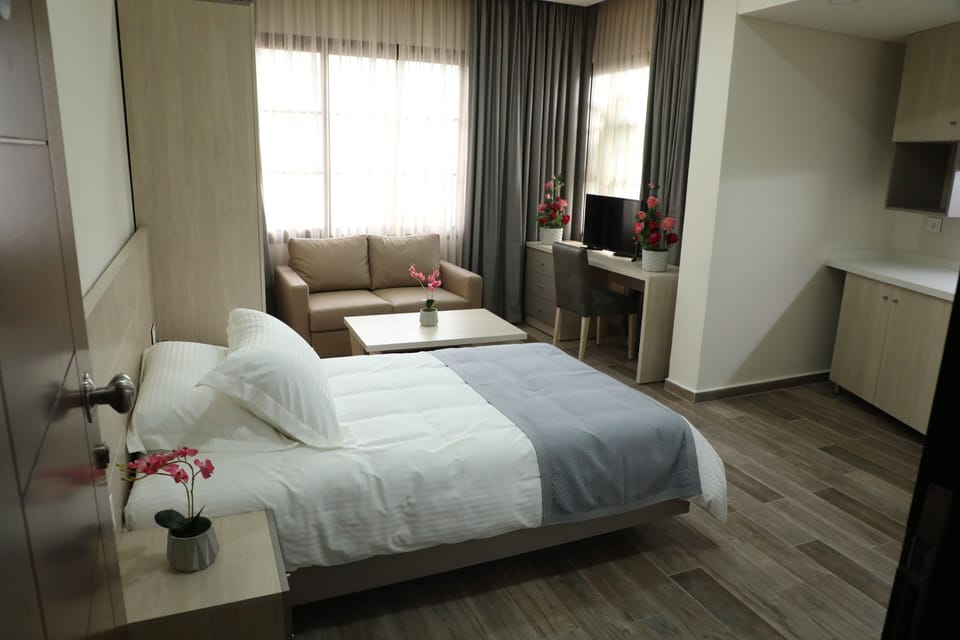 Hypo-allergenic bedding available, minibar, in-room safe