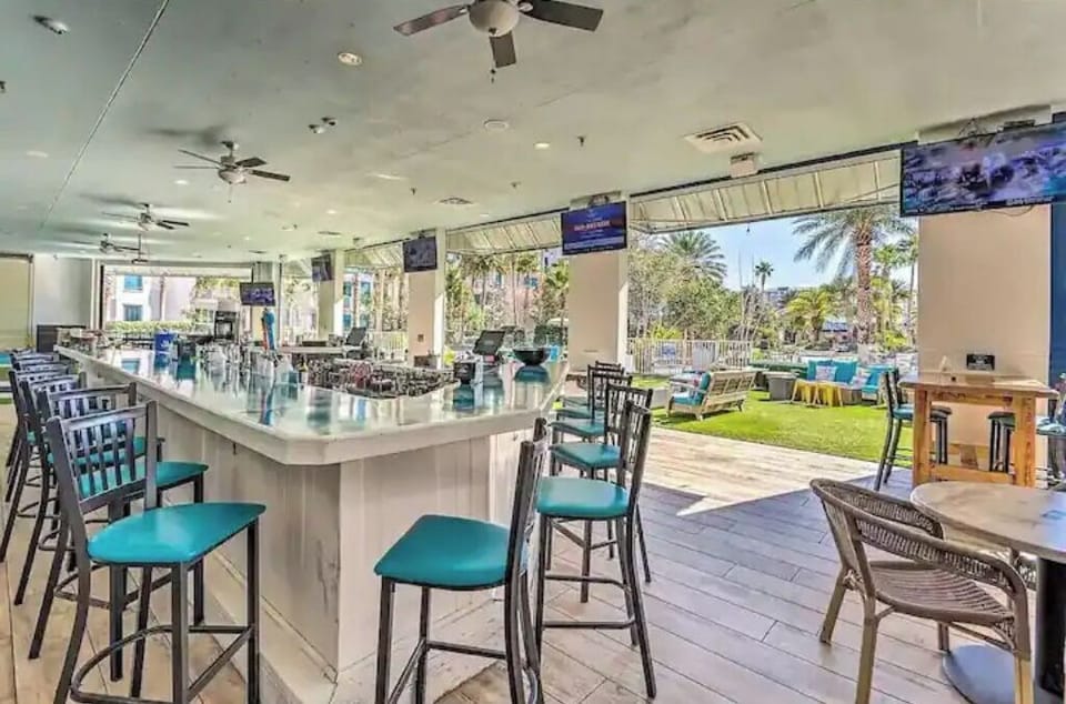 Sports bar with outdoor access to the pool area.
