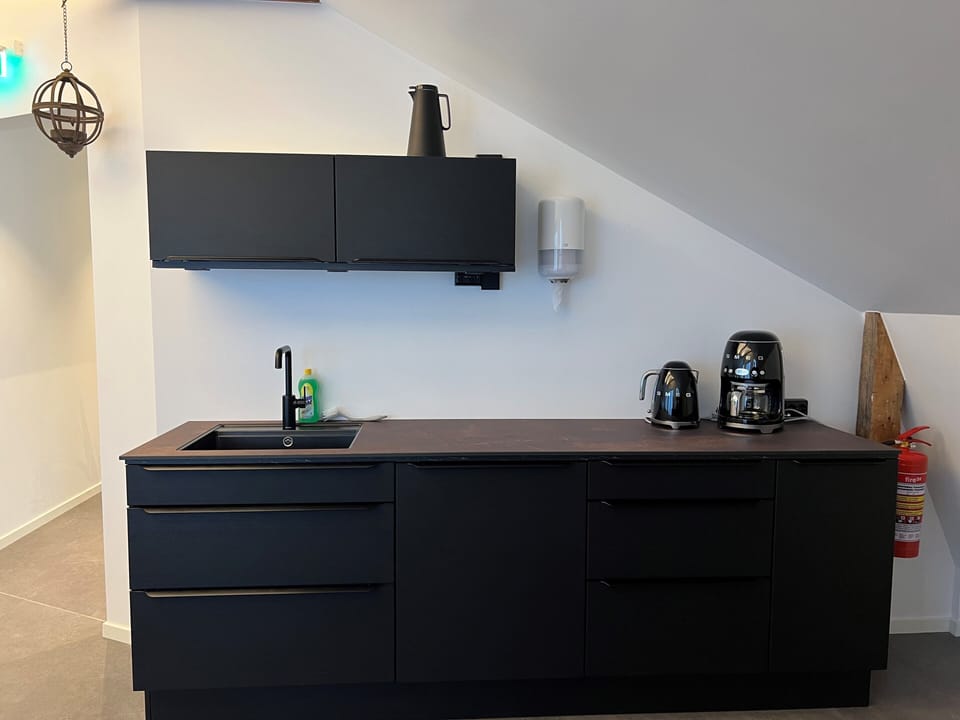 Standard Double Room, Oceanfront | Shared kitchen facilities | Highchair