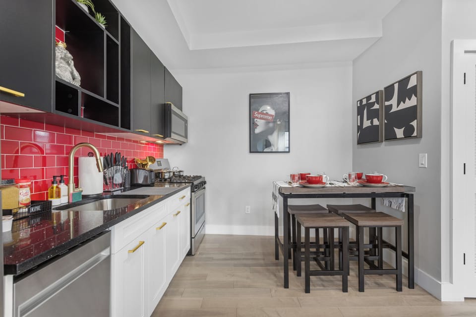 Intimate 4-seater dining area with a stylish table and comfortable chairs, perfect for sharing meals and creating cherished memories with loved ones.
