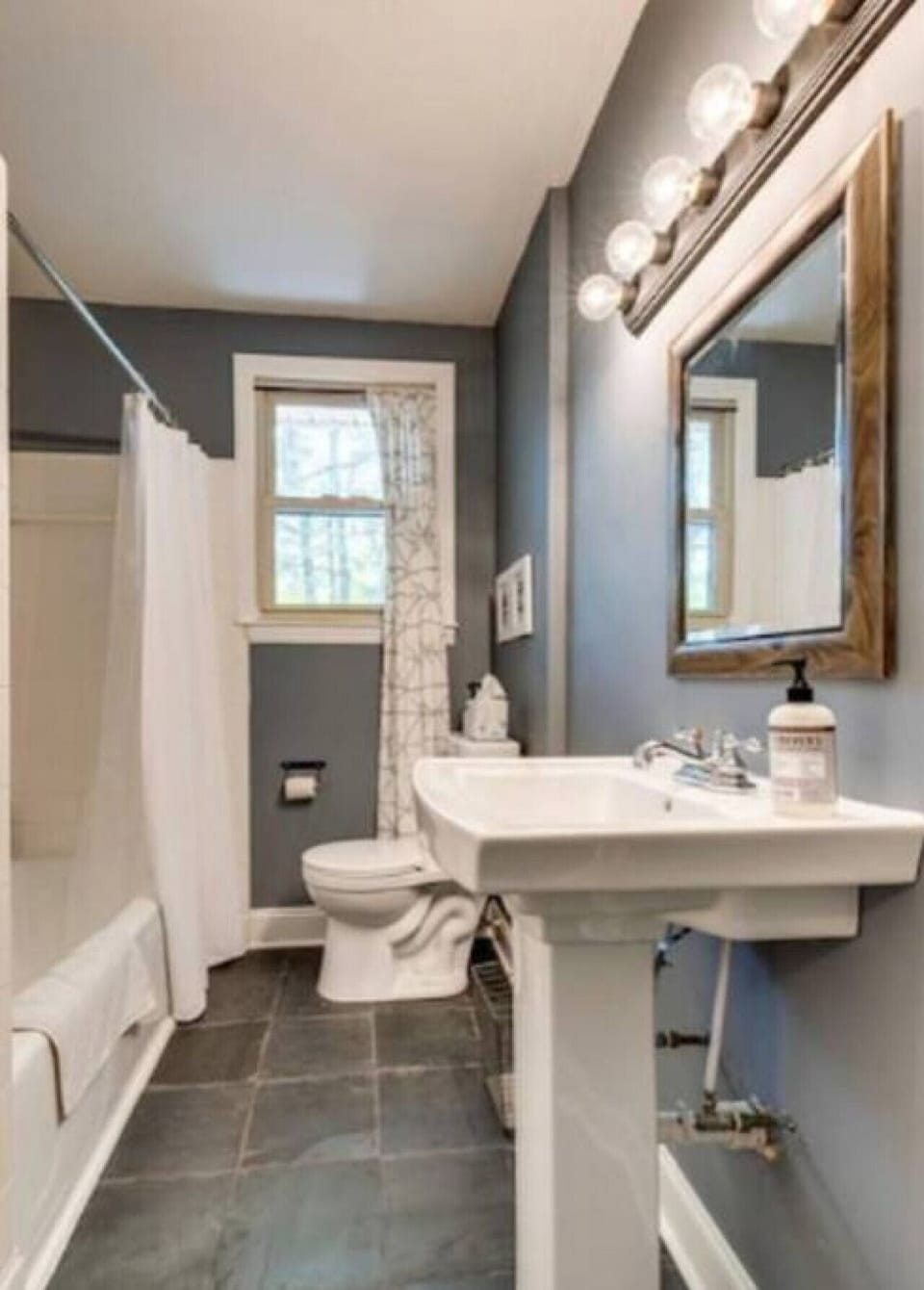 The full bathroom next to the two guest rooms.