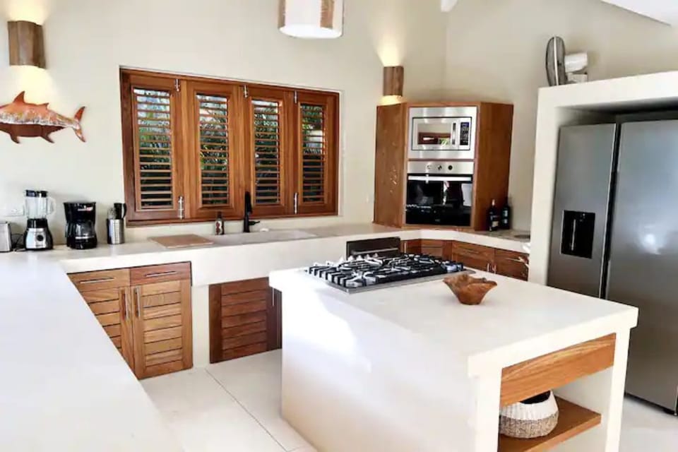 Refrigerator with water dispensing in the door. Water dispenser out on the patio