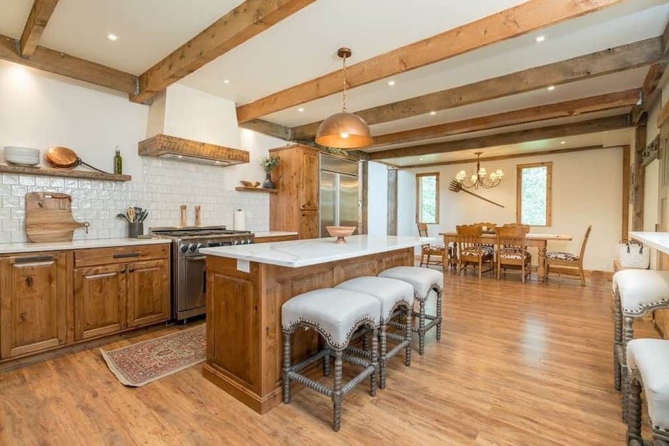 Open floor plan between kitchen and dining room.  Plenty of seating