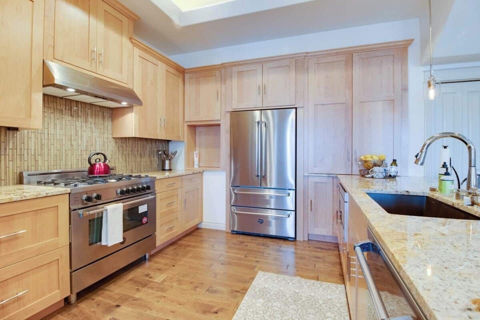 Custom Gourmet Chef's Kitchen.  With Coffee maker, coffee, tea, and dishes ready to cook in. Gas range and stove.