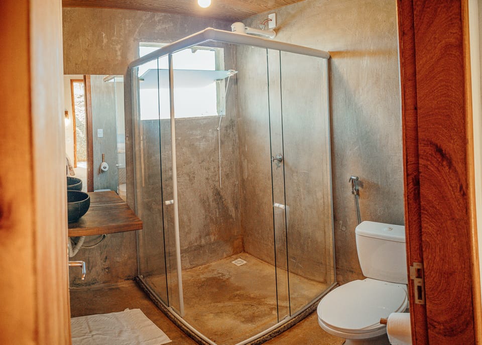 Triple Room, Sea View | Bathroom | Shower, rainfall showerhead, free toiletries, towels