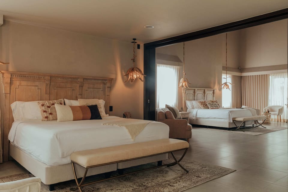 Grand Studio Suite | Minibar, in-room safe, desk, iron/ironing board