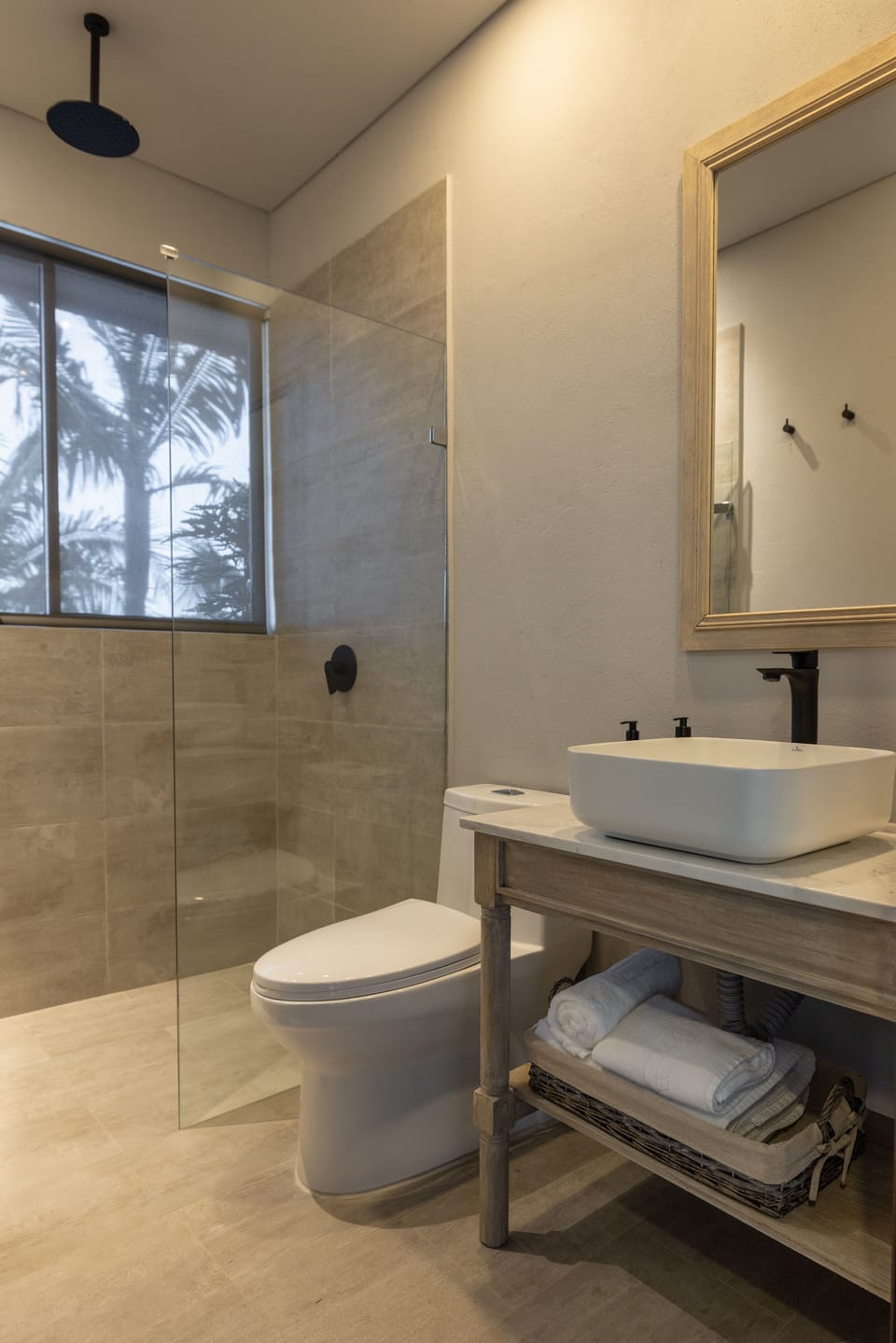 Shower, rainfall showerhead, hair dryer, towels