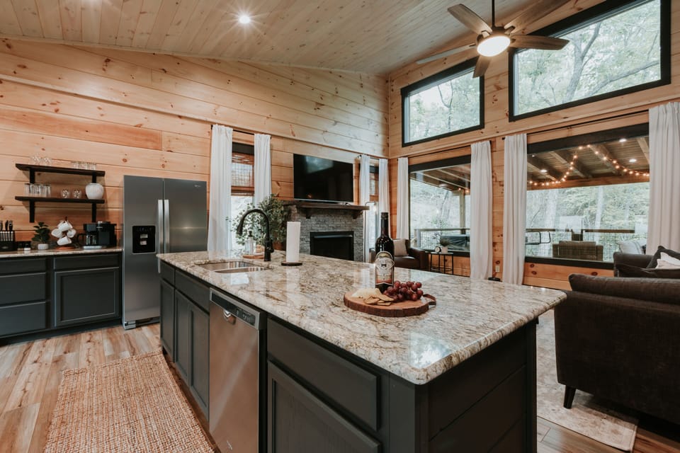 Granite counter top island for plenty of space to cook.