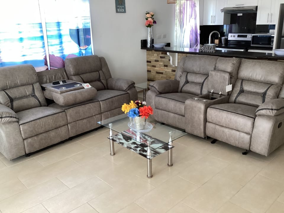 Leather sofa with cell phone charging 