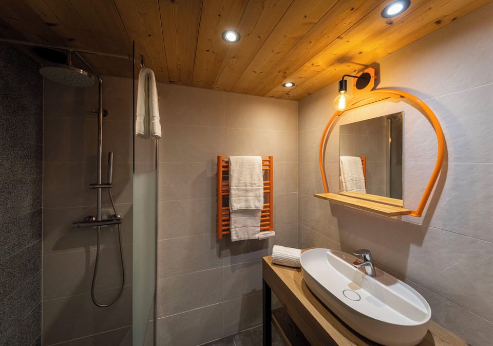 Freshen up in the bathroom after a day of adventure.