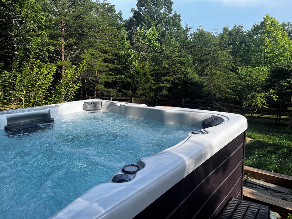 Relax in the new and private hot tub.