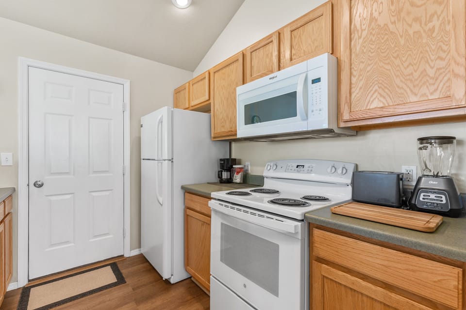 Microwave, blender, and a 12 cup Coffee Maker will make you feel at home.