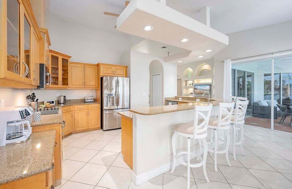 Large Kitchen Great for Entertainment with Bar and Additional Seating