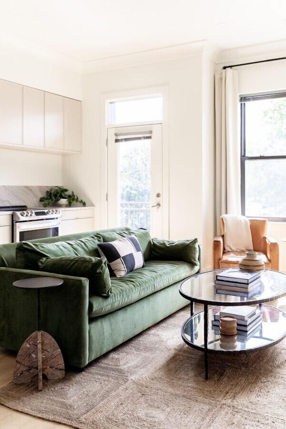 Spacious living room that opens up into the kitchen. The couch turns into a sleeper sofa. HD TV with cable and all the apps you could want. Private patio, that faces Belmont University, with seating for 2.