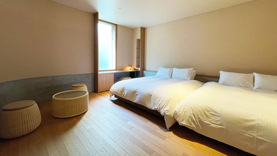 Deluxe Twin Room, Non Smoking | Laptop workspace, soundproofing, free WiFi, bed sheets