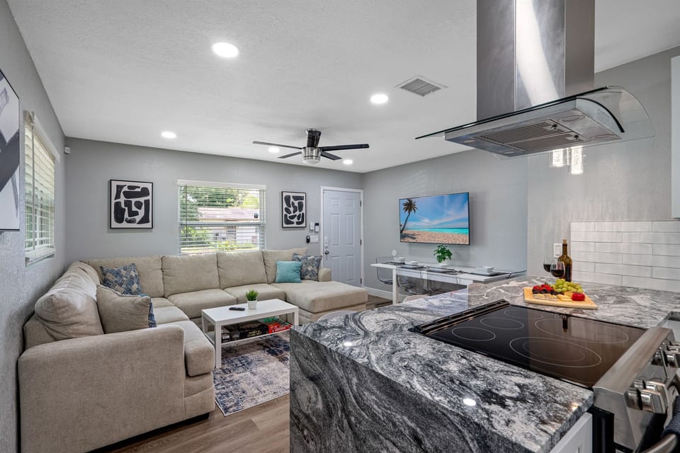 Our spacious living room with comfortable L-Shaped couch where you and your family and friends can bond and relax.