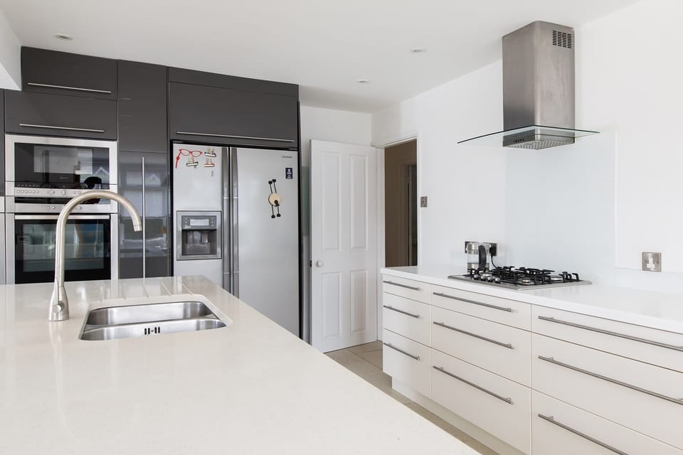 You have plenty of cupboard space and a huge American fridge freezer.