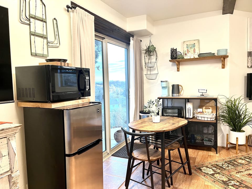 Kitchenette: refridgerator/freezer, microwave, Keurig coffee pot & Water kettle