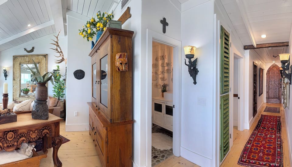 Entry to 1/2 bath, just off the living space for guests convenience 