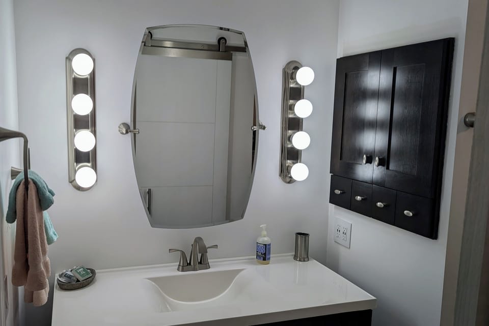 The primary bedroom bathroom offers plenty of room for everything that you bring along.