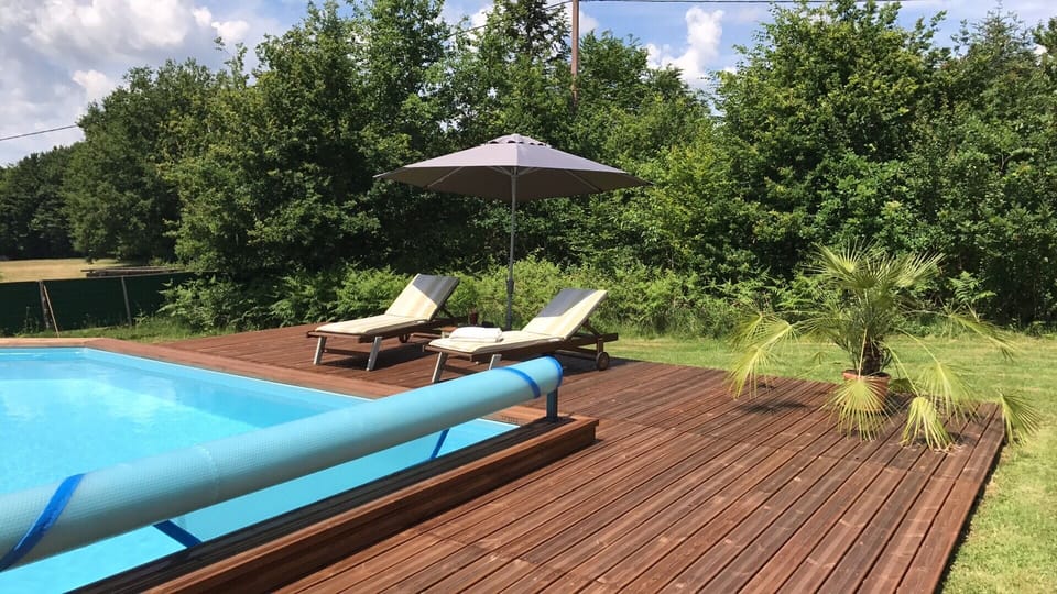 Sun loungers by the pool. 
