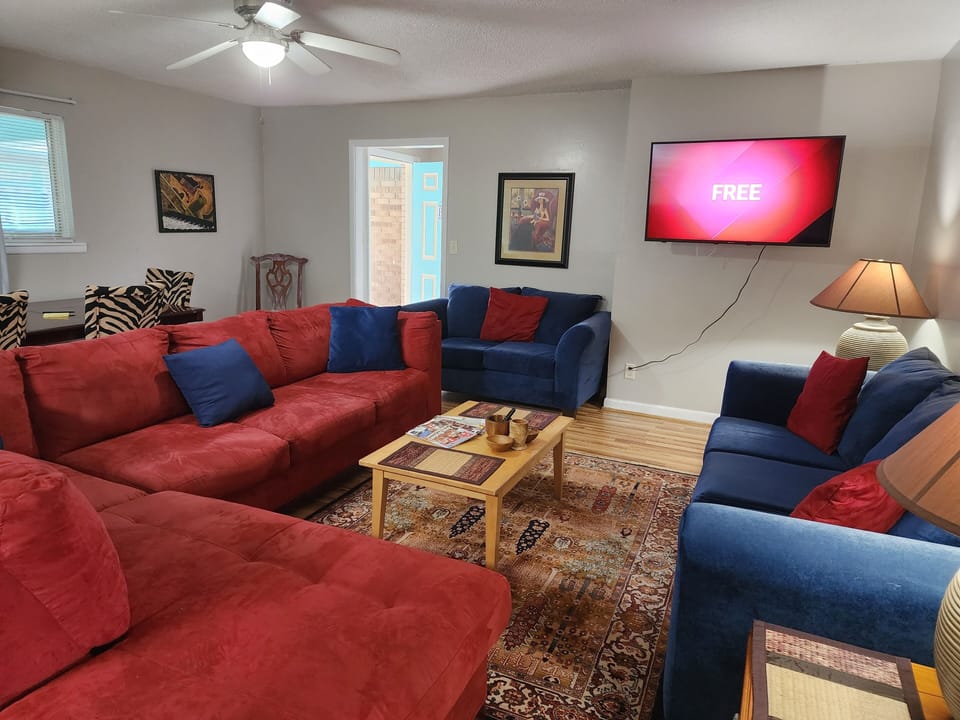 spacious living room with smart tv