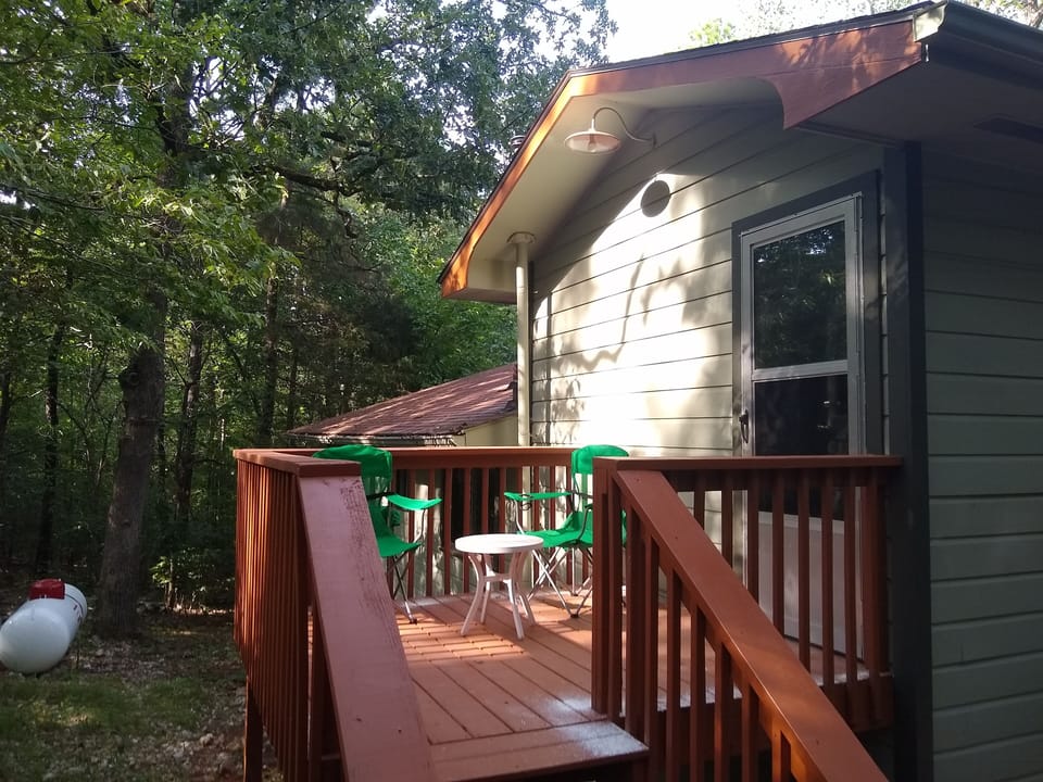 walk out from the upper bedroom to the back deck