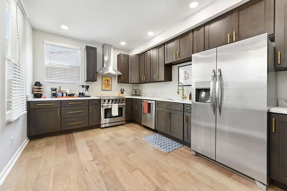 Modern kitchen with stainless steel appliances and ample space