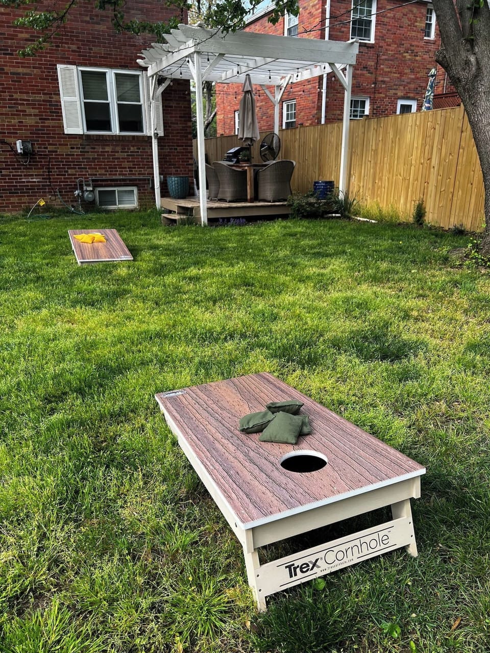 Play corn hole with your kids or "grown up kids" in the backyard!