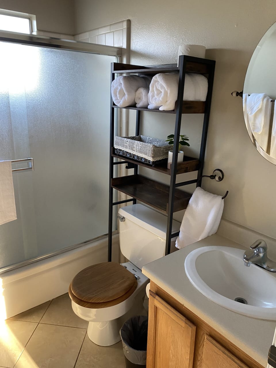 Bathroom with tub/shower.  Luxury towels, shampoo, conditioner and soap provided