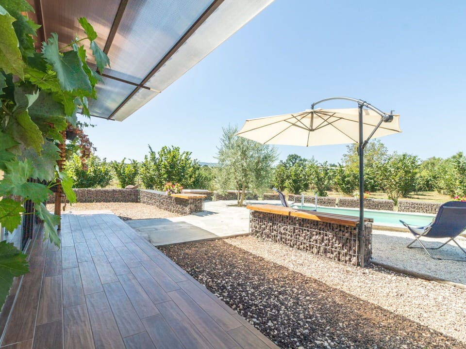 Sky, Shade, Plant, Leisure, Urban Design, Wood, Landscape, Real Estate, Outdoor Furniture, Roof