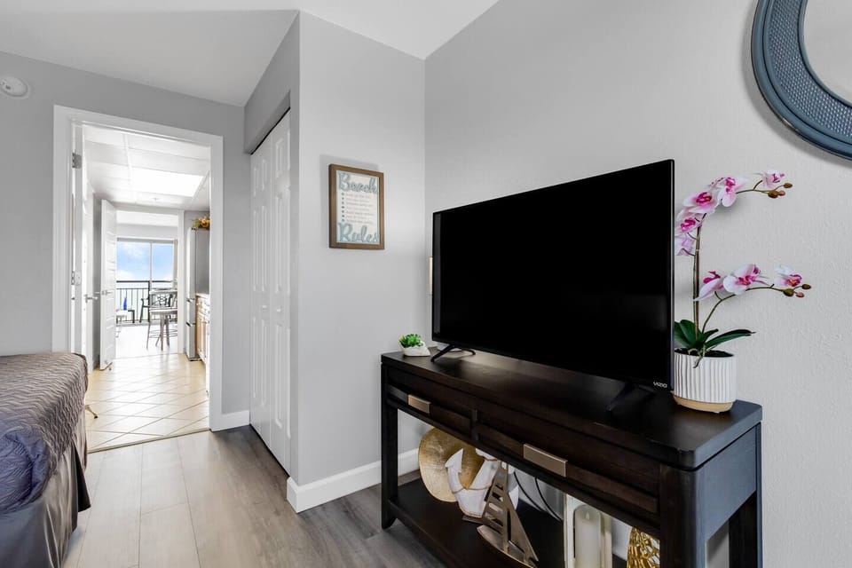 There is a TV in the bedroom.