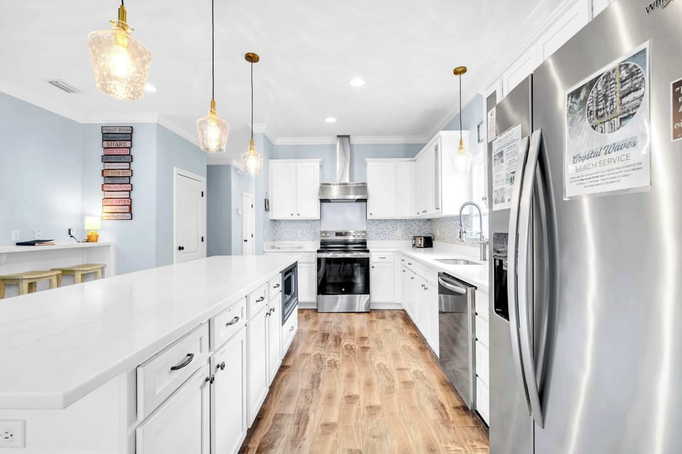 Classic & Elegant Stainless Steel Appliance Filled Kitchen, Large Granite Island