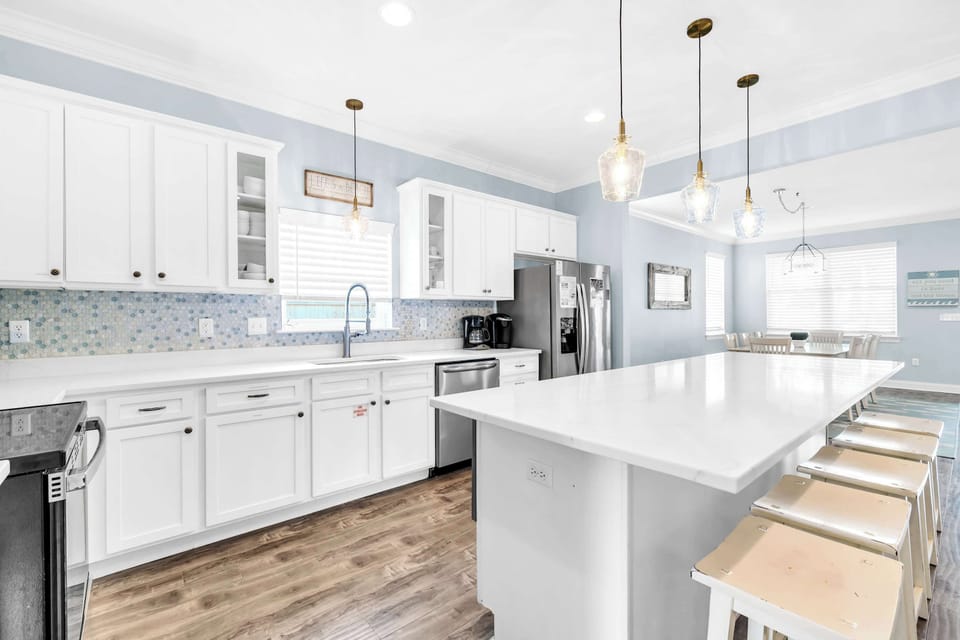Classic & Elegant Stainless Steel Appliance Filled Kitchen, Large Granite Island
